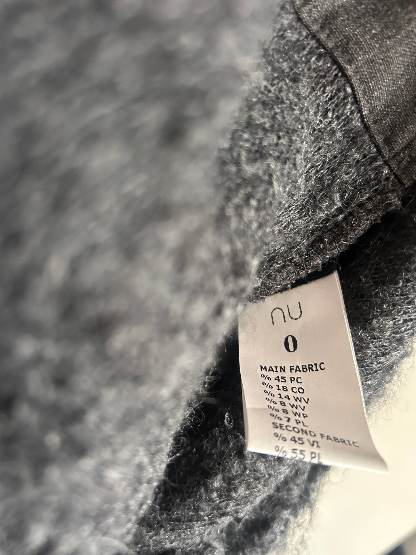 NU Black fuzzy jumper with funnel neck size 10-14