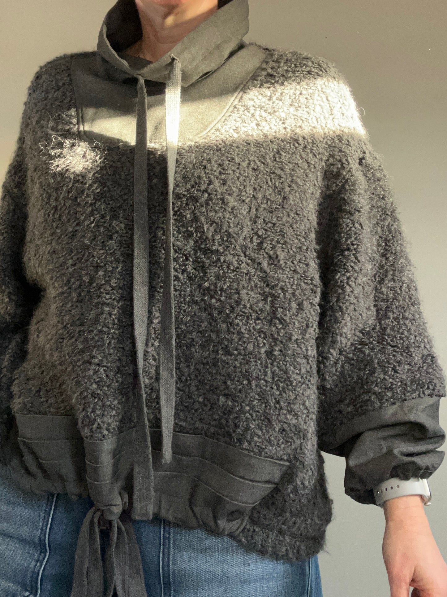 NU Black fuzzy jumper with funnel neck size 10-14