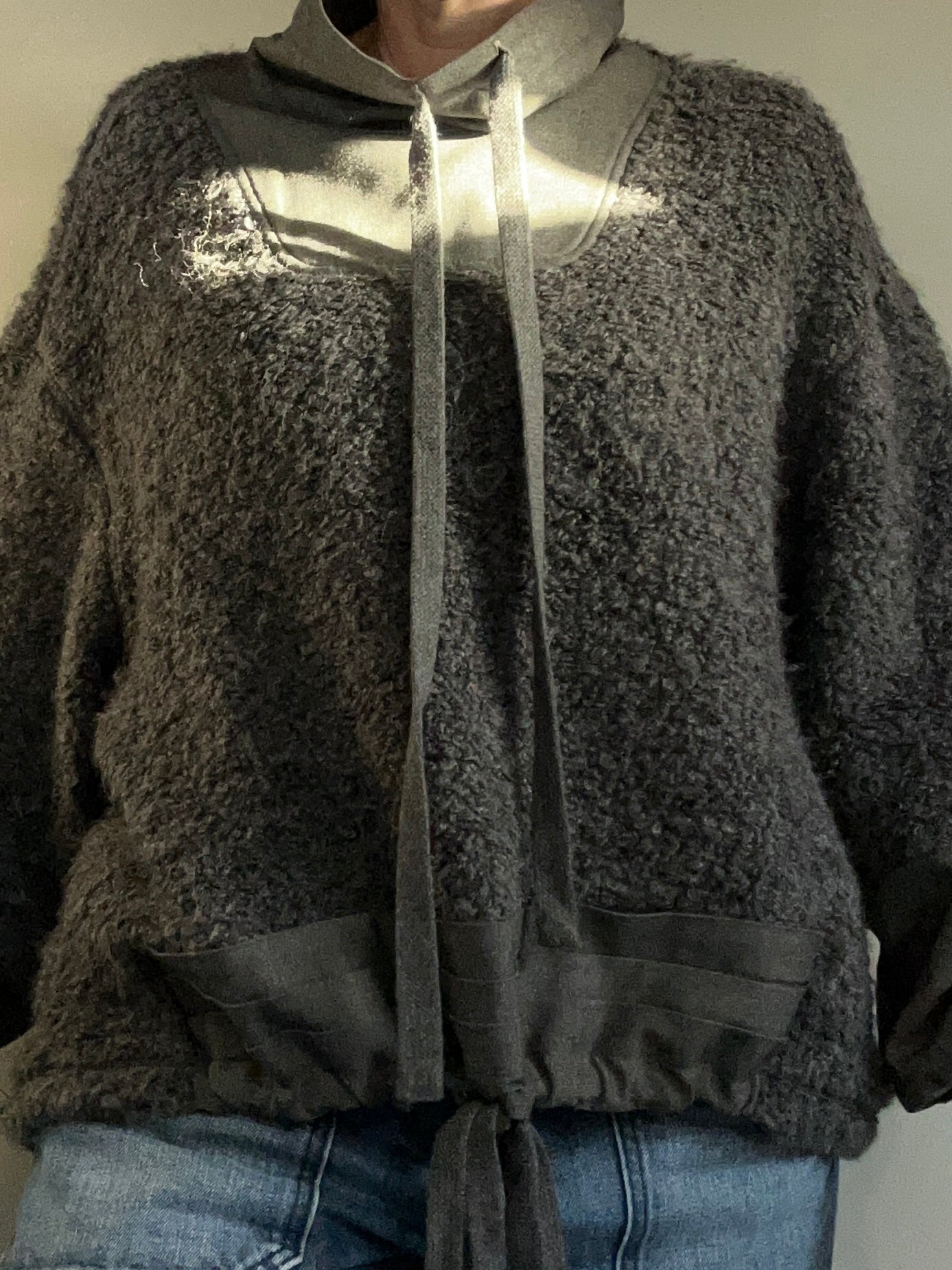 NU Black fuzzy jumper with funnel neck size 10-14