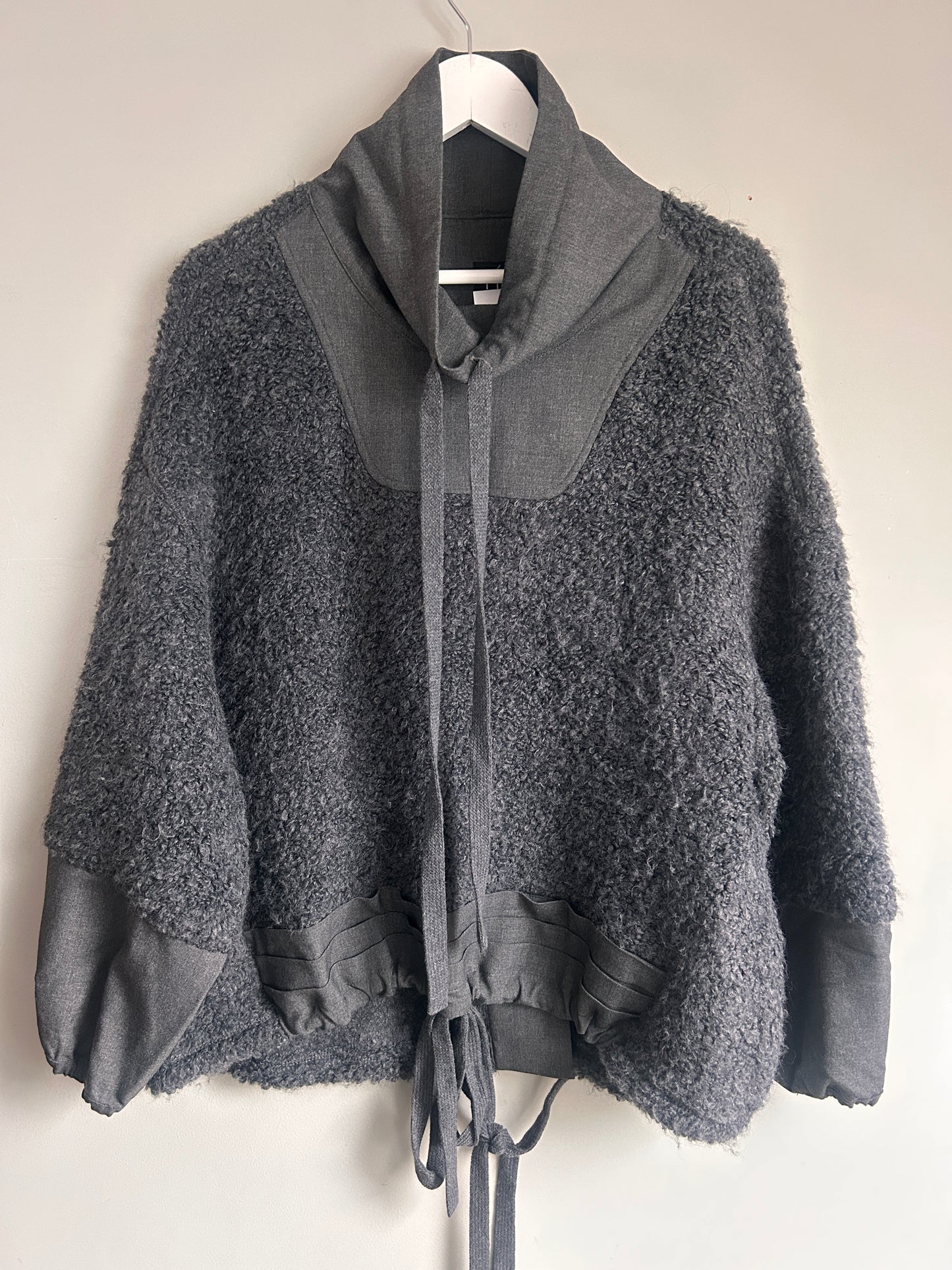 NU Black fuzzy jumper with funnel neck size 10-14