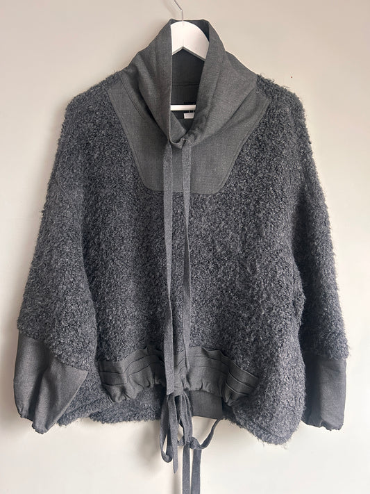 NU Black fuzzy jumper with funnel neck size 10-14