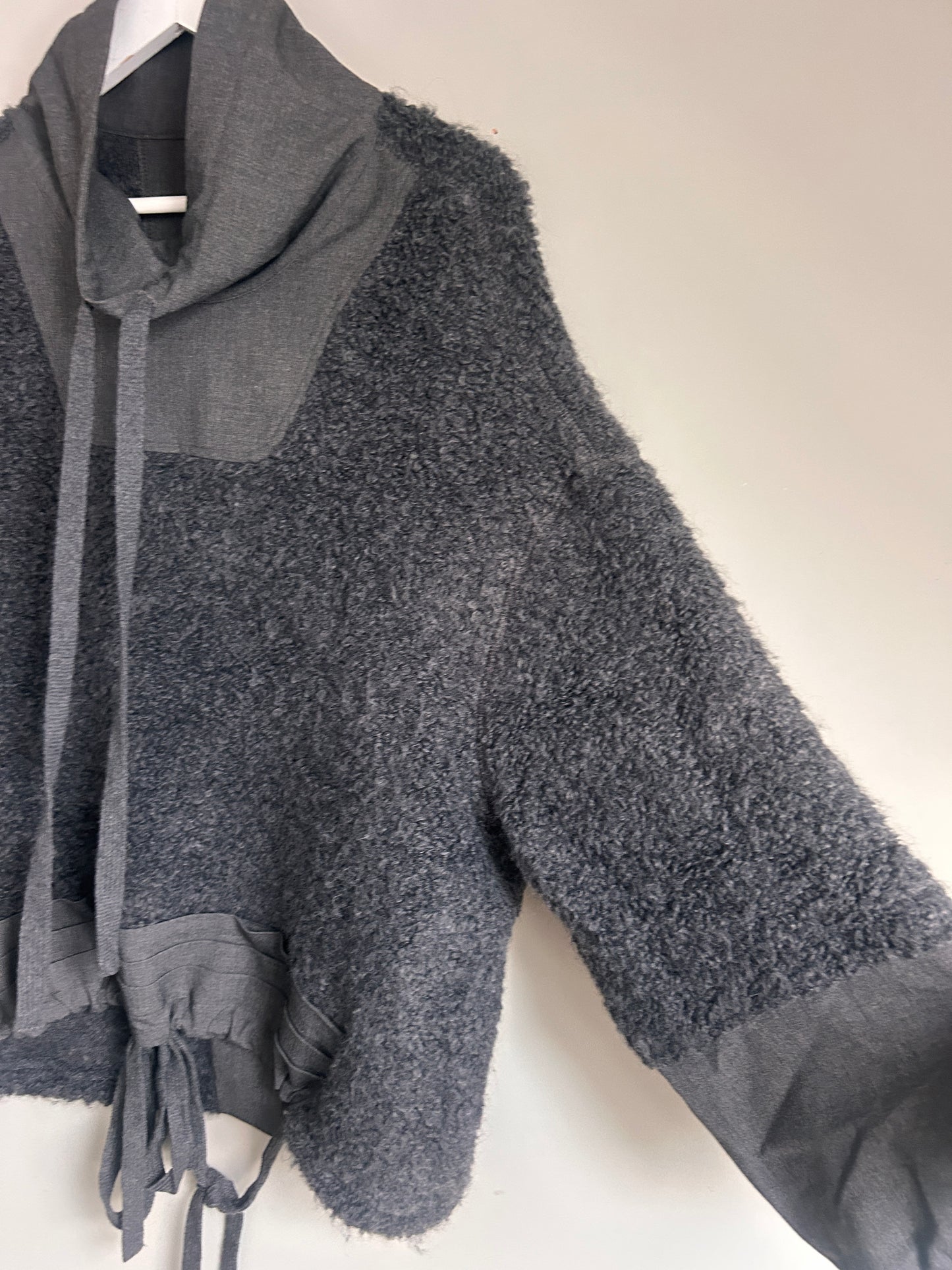 NU Black fuzzy jumper with funnel neck size 10-14