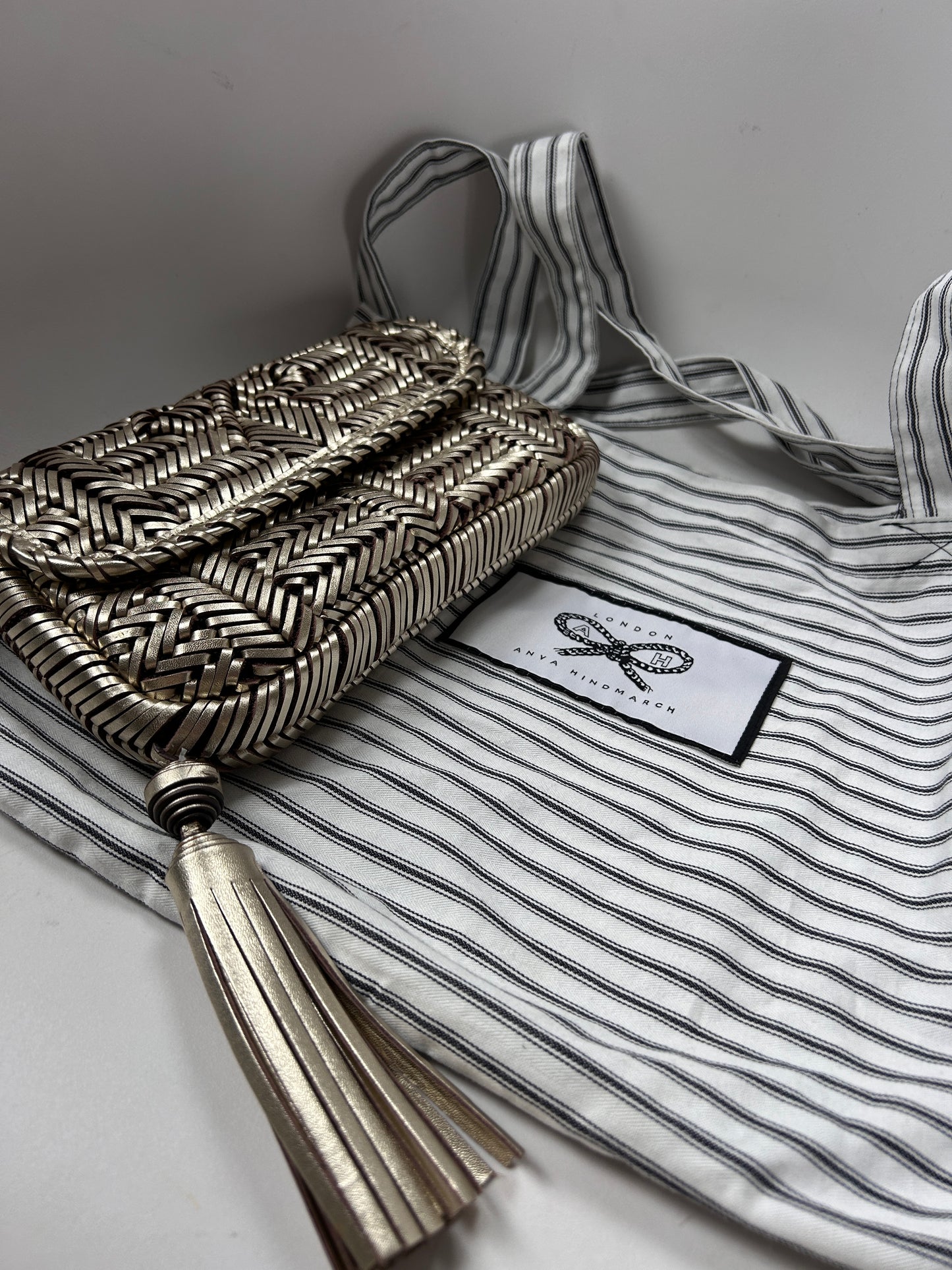 Anya Hindmarsh pale gold plaited leather Rossum clutch